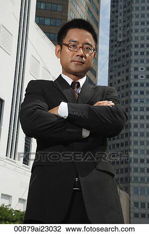 Businessman looking at camera View Large Photo Image Stock Image - Businessman looking at camera. Fotosearch