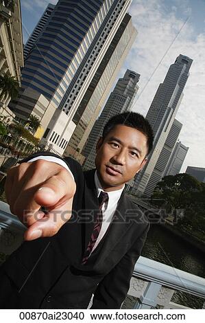 Businessman pointing at camera View Large Photo Image Stock Image - Businessman pointing at camera. Fotosearch