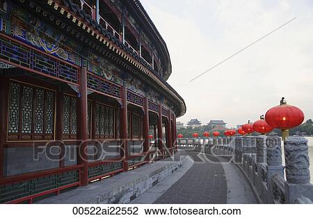 Stock Image - Chinese lanterns next to a temple. Fotosearch
