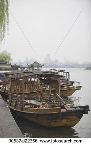 Stock Photograph - Excursion boats, West Lake, Hangzhou, China. Fotosearch