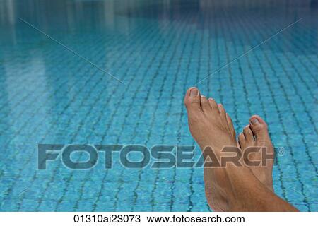 Feet at a swimming pool View Large Photo Image Stock Image - Feet at a swimming pool. Fotosearch