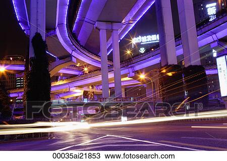 Stock Image - Freeway at night, Shanghai, China. Fotosearch
