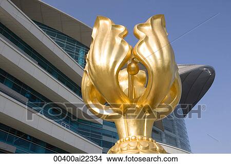 Picture - Golden Bauhinia sculpture at Convention Centre Square, Wanchai, Hong Kong. Fotosearch