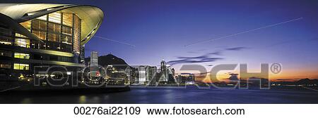 Stock Photo - Hong Kong Convention Centre at sunset. Fotosearch