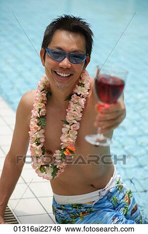 Man toasting at camera View Large Photo Image Stock Photo - Man toasting at camera. Fotosearch