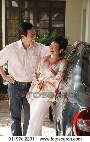 Stock Image - Mature couple looking at each other. Fotosearch