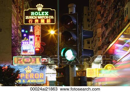 Stock Image - Neon signs along Nathan Road, Hong Kong. Fotosearch