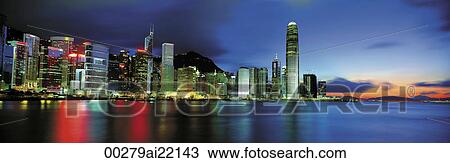 Stock Image - Panoramic skyline of Victoria Harbour from Wanchai, Hong Kong. Fotosearch