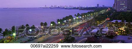 Roxas Boulevard at dusk, Manila, Philippines View Large Photo Image Stock Photo - Roxas Boulevard at dusk, Manila, Philippines. Fotosearch