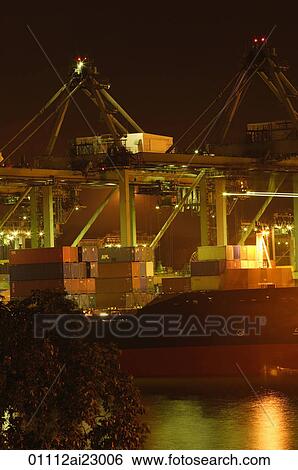 Stock Photograph - Shipping port at night. Fotosearch