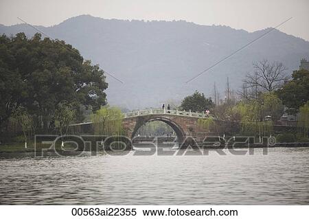 Su causeway, West Lake, Hangzhou, China View Large Photo Image Stock Photography - Su causeway, West Lake, Hangzhou, China. Fotosearch