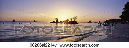 Stock Photo - Sunset at Boracay Beach, Philippines. Fotosearch