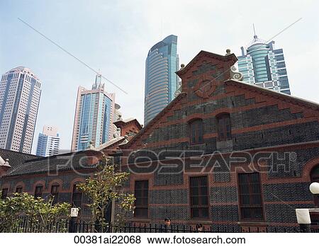 Stock Photo - The historical house next to the new buildings Pudong, Shanghai, China. Fotosearch