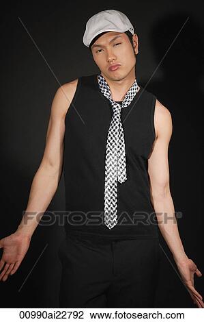 Young man shrugging at camera View Large Photo Image Stock Image - Young man shrugging at camera. Fotosearch
