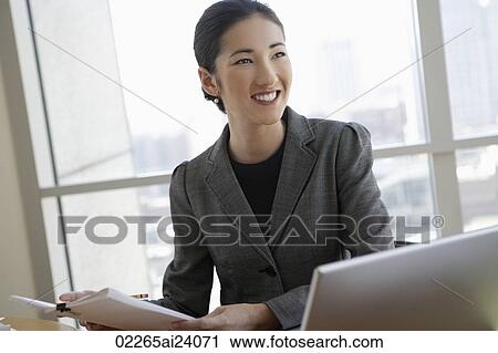 businesswoman at desk View Large Photo Image Stock Image - businesswoman at desk. Fotosearch
