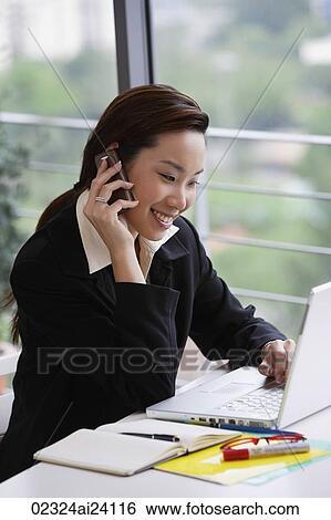 businesswoman on cell phone View Large Photo Image Stock Photograph - businesswoman on cell phone. Fotosearch