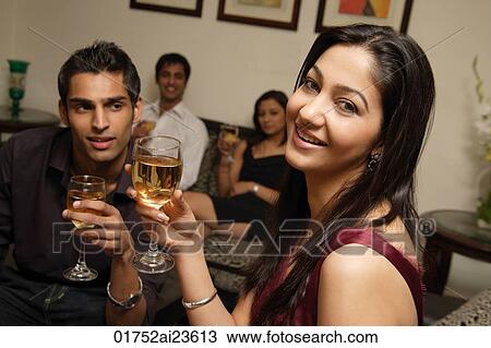 couple at party, woman looking at camera, guy looking at woman View Large Photo Image Stock Image - couple at party, woman looking at camera, guy looking at woman. Fotosearch