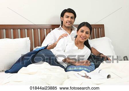 Couple in bed View Large Photo Image Stock Photography - Couple in bed. Fotosearch
