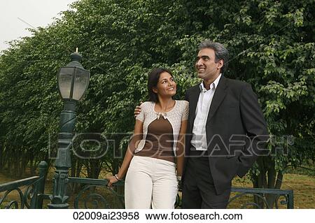 couple in park View Large Photo Image Stock Photo - couple in park. Fotosearch
