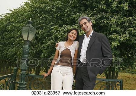 couple in park View Large Photo Image Stock Photo - couple in park. Fotosearch