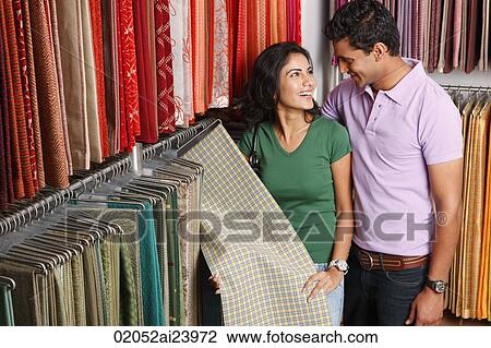 couple shopping for fabric View Large Photo Image Stock Image - couple shopping for fabric. Fotosearch