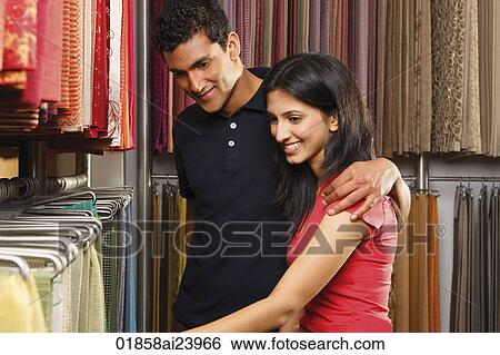 couple shopping for fabric View Large Photo Image Stock Photograph - couple shopping for fabric. Fotosearch