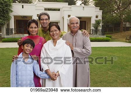 Stock Photo - family in front of home. Fotosearch