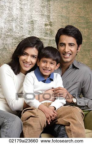 family of three smiling at camera (vertical) View Large Photo Image Stock Image - family of three smiling at camera (vertical). Fotosearch
