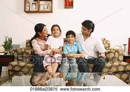 Family on couch View Large Photo Image Stock Photography - Family on couch. Fotosearch