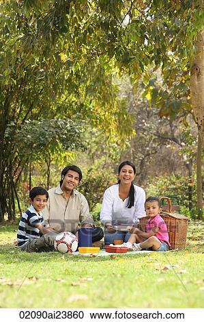 Family picnic in park View Large Photo Image Stock Image - Family picnic in park. Fotosearch