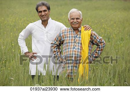father and son farmers in field View Large Photo Image Stock Image - father and son farmers in field. Fotosearch