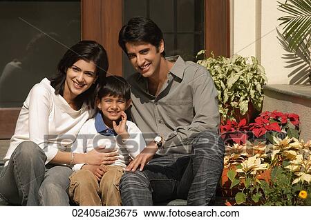 father, mother, son smile for camera on front doorstep View Large Photo Image Stock Photography - father, mother, son smile for camera on front doorstep. Fotosearch