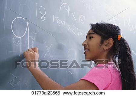 girl at chalkboard (side view) View Large Photo Image Stock Photography - girl at chalkboard (side view). Fotosearch