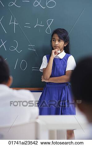 girl at chalkboard View Large Photo Image Stock Image - girl at chalkboard. Fotosearch