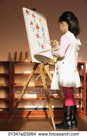 Girl painting on canvas View Large Photo Image Picture - Girl painting on canvas. Fotosearch