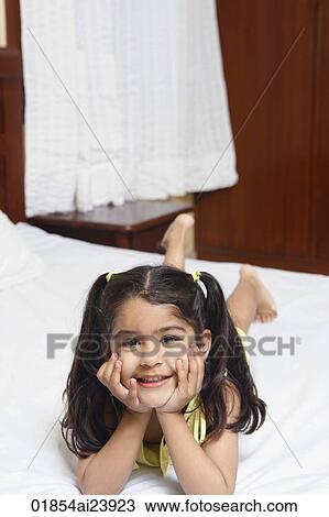 Girl resting chin in hands View Large Photo Image Stock Image - Girl resting chin in hands. Fotosearch