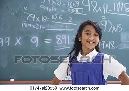 girl with hands on hips, smiling at camera View Large Photo Image Stock Photo - girl with hands on hips, smiling at camera. Fotosearch