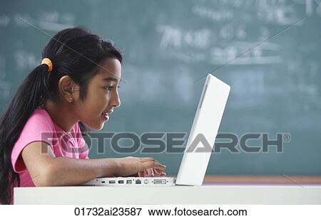 girl working at laptop (horizontal) View Large Photo Image Stock Photo - girl working at laptop (horizontal). Fotosearch