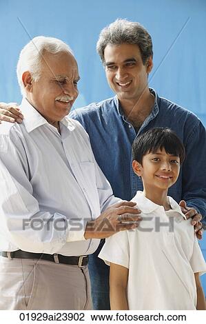 Grandfather, father & son, grandfather with hands on grandson's shoulders View Large Photo Image Stock Image - Grandfather, father & son, grandfather with hands on grandson's shoulders. Fotosearch