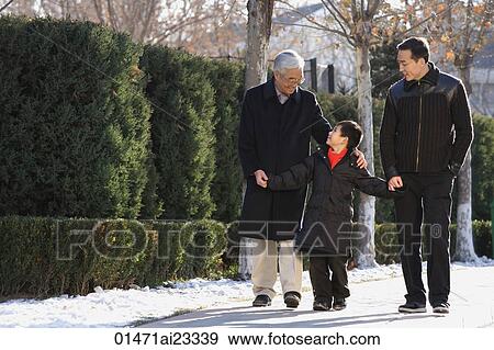 Grandfather, son and grandson in the park View Large Photo Image Stock Photo - Grandfather, son and grandson in the park. Fotosearch