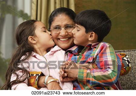 grandkids kiss grandmother cheeks View Large Photo Image Stock Image - grandkids kiss grandmother cheeks. Fotosearch