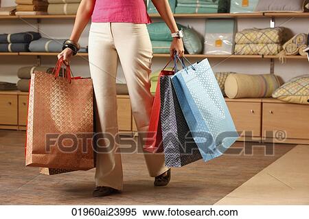 lady with shopping bags View Large Photo Image Stock Photography - lady with shopping bags. Fotosearch
