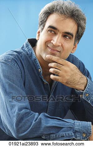 Man with gray hair, hand on chin View Large Photo Image Stock Image - Man with gray hair, hand on chin. Fotosearch