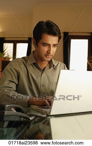 man working at laptop View Large Photo Image Stock Photo - man working at laptop. Fotosearch