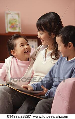 Mother with son and daughter at home View Large Photo Image Stock Photo - Mother with son and daughter at home. Fotosearch