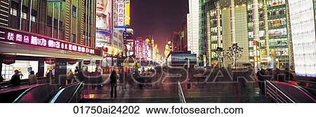 Stock Image - Nanjing Road at night, Shanghai. Fotosearch