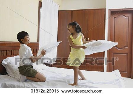 Pillow fight View Large Photo Image Stock Photography - Pillow fight. Fotosearch