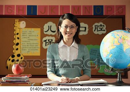 School teacher in class View Large Photo Image Stock Photo - School teacher in class. Fotosearch