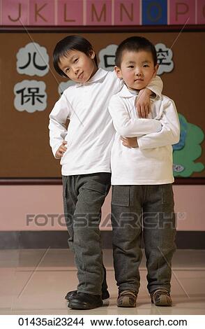 Schoolboys in class looking at camera View Large Photo Image Picture - Schoolboys in class looking at camera. Fotosearch