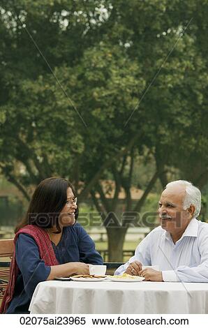 senior couple having coffee outdoors View Large Photo Image Stock Photography - senior couple having coffee outdoors. Fotosearch
